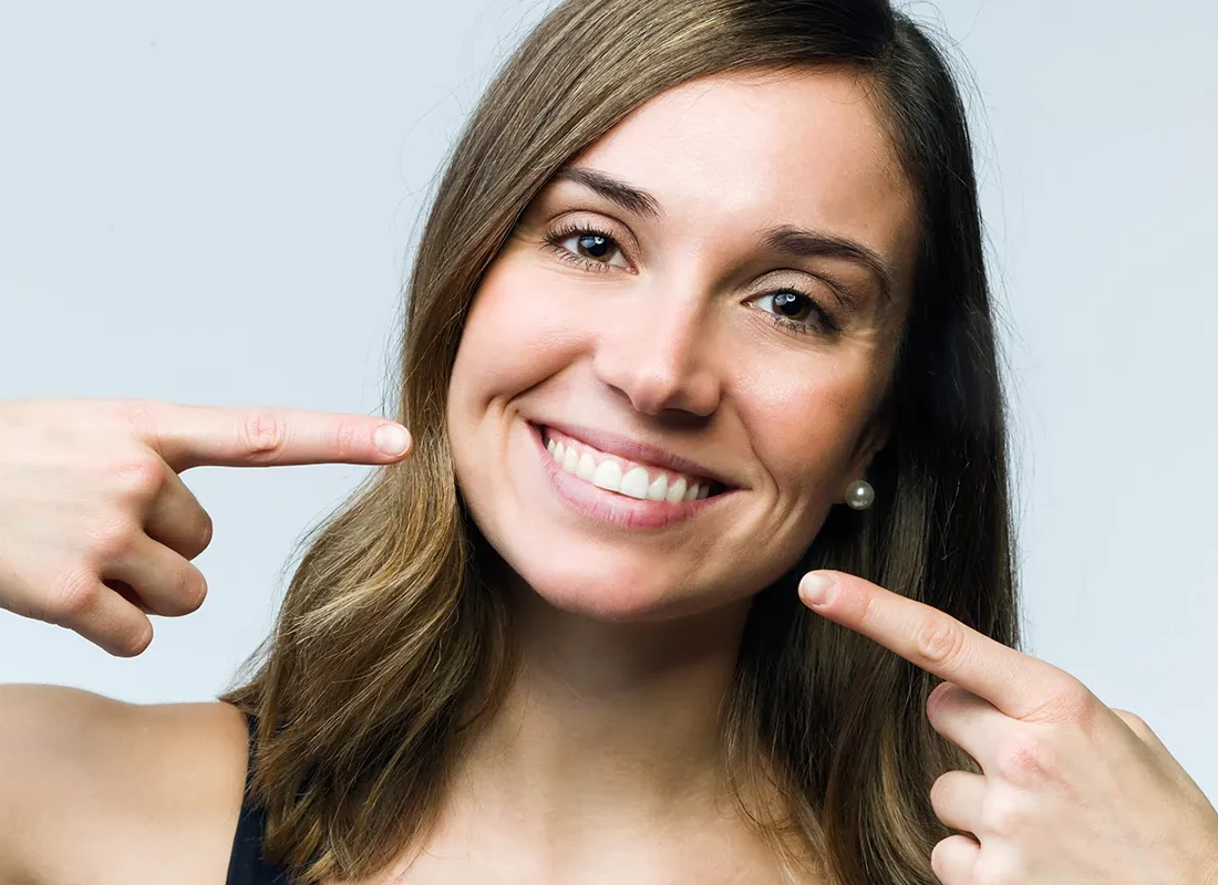 A dentist at California Coast Dental Arts caring for a patient